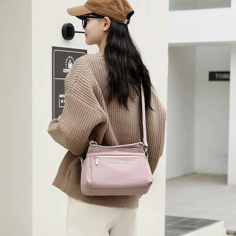 NNEDSZ Black Waterproof Nylon Crossbody Bag - Lightweight and Adjustable Strap Shoulder Bag for Women