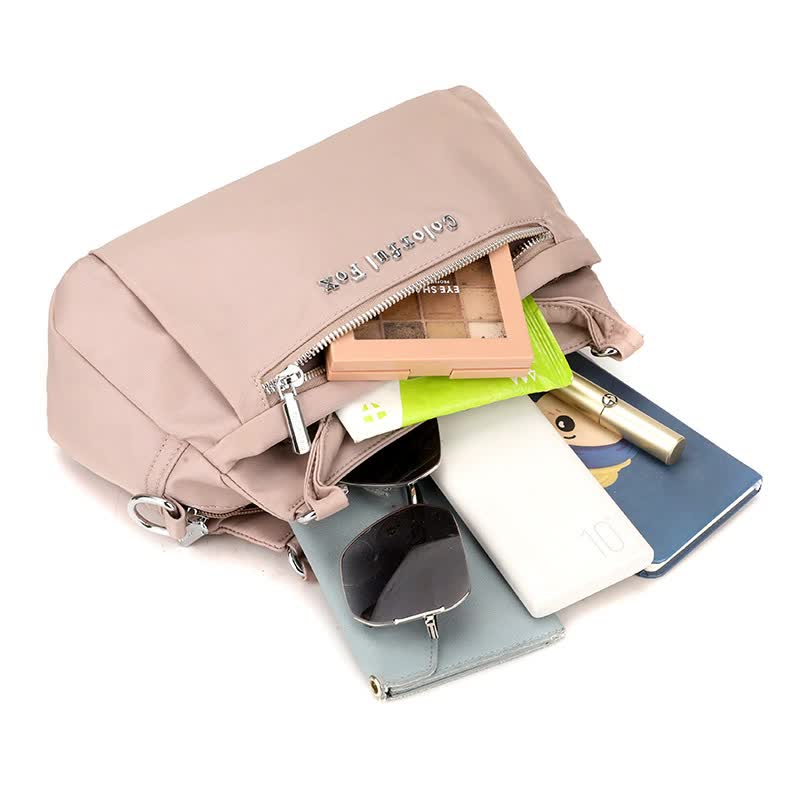 NNEDSZ Black Waterproof Nylon Crossbody Bag - Lightweight and Adjustable Strap Shoulder Bag for Women